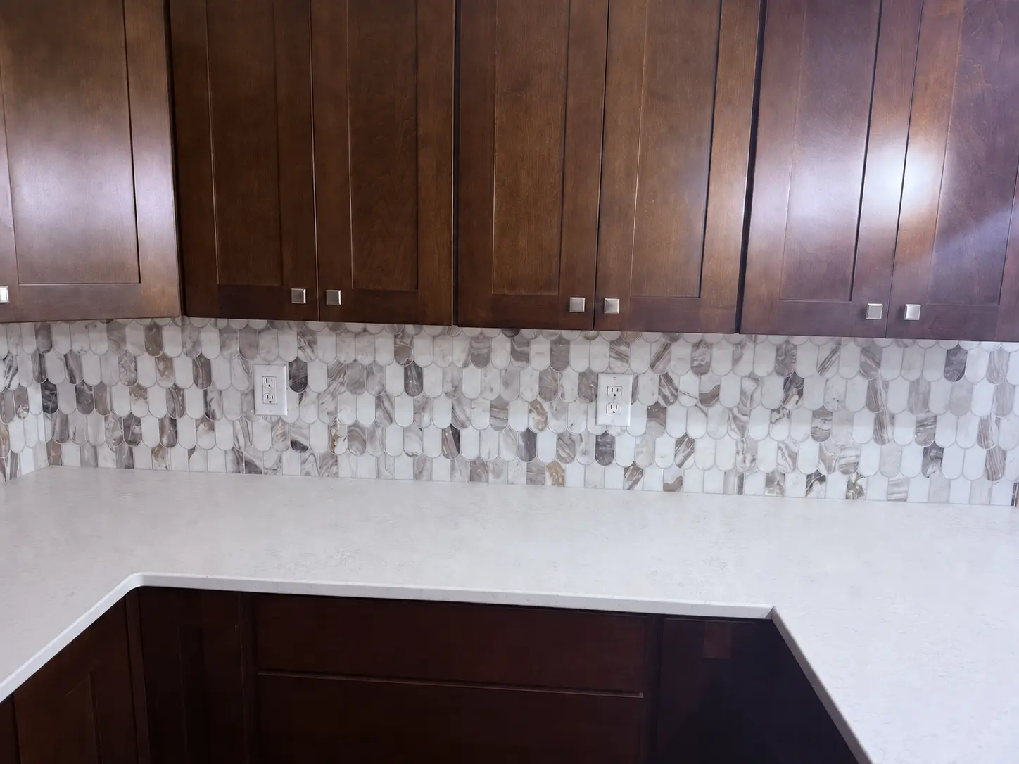 Marble mosaic backsplash installed by Carrion Services in the Charlotte metro area